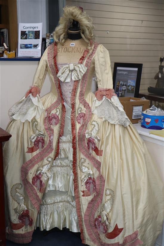 Countess Almavivas costume for The Marriage of Figaro. A cream silk dress, under skirt, looped petticoat and blonde